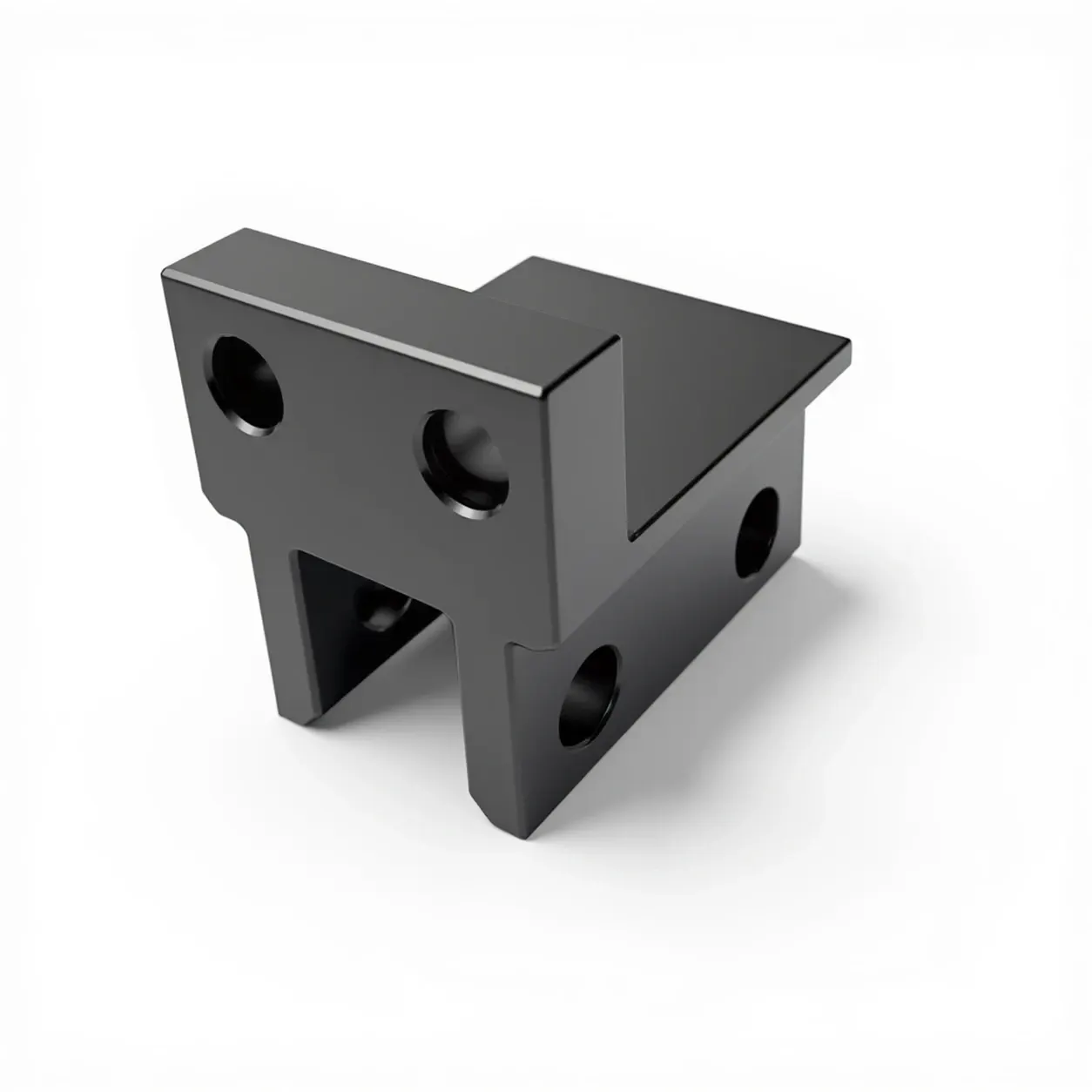 Stepped mounting block — Black-coated aluminium, stepped body, multi-directional mounting holes